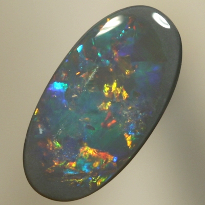 SOLID SEMI BLACK OPAL Sparkling red, orange and green move brightly